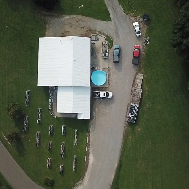 photo from above showing white roof of building